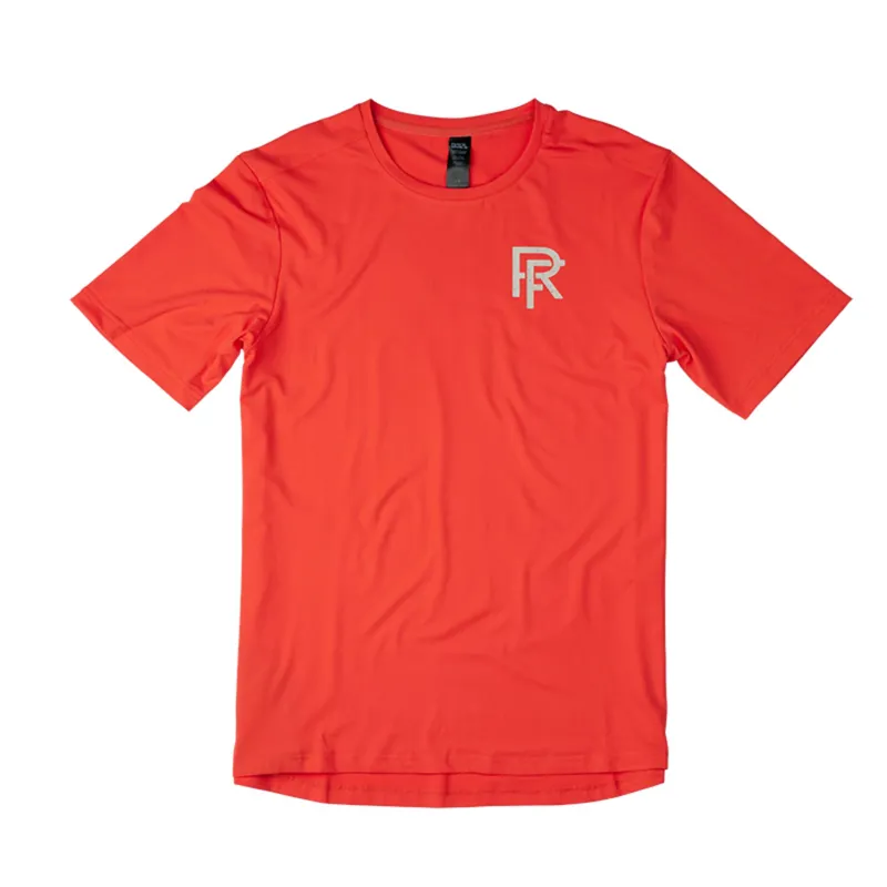 Race Face Commit Short Sleeve Tech Top in Coral